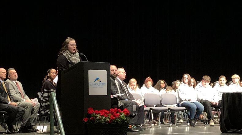 Dani Hower, a graduate of the Clark State Scholars Program and current Clark State Community College student, addresses the 80 newest inductees of the Scholars Program at the Clark State Performing Arts Center during an induction ceremony on Tuesday, Jan. 22. Photo by Brett Turner