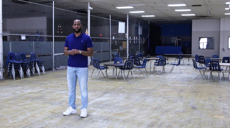 James Cooper stands inside a 12,000 square foot space at the Southern Village shopping center that will offer sports lessons as well as tutoring sessions, counseling and discussions centered around mental health. Hasan Karim/ Staff