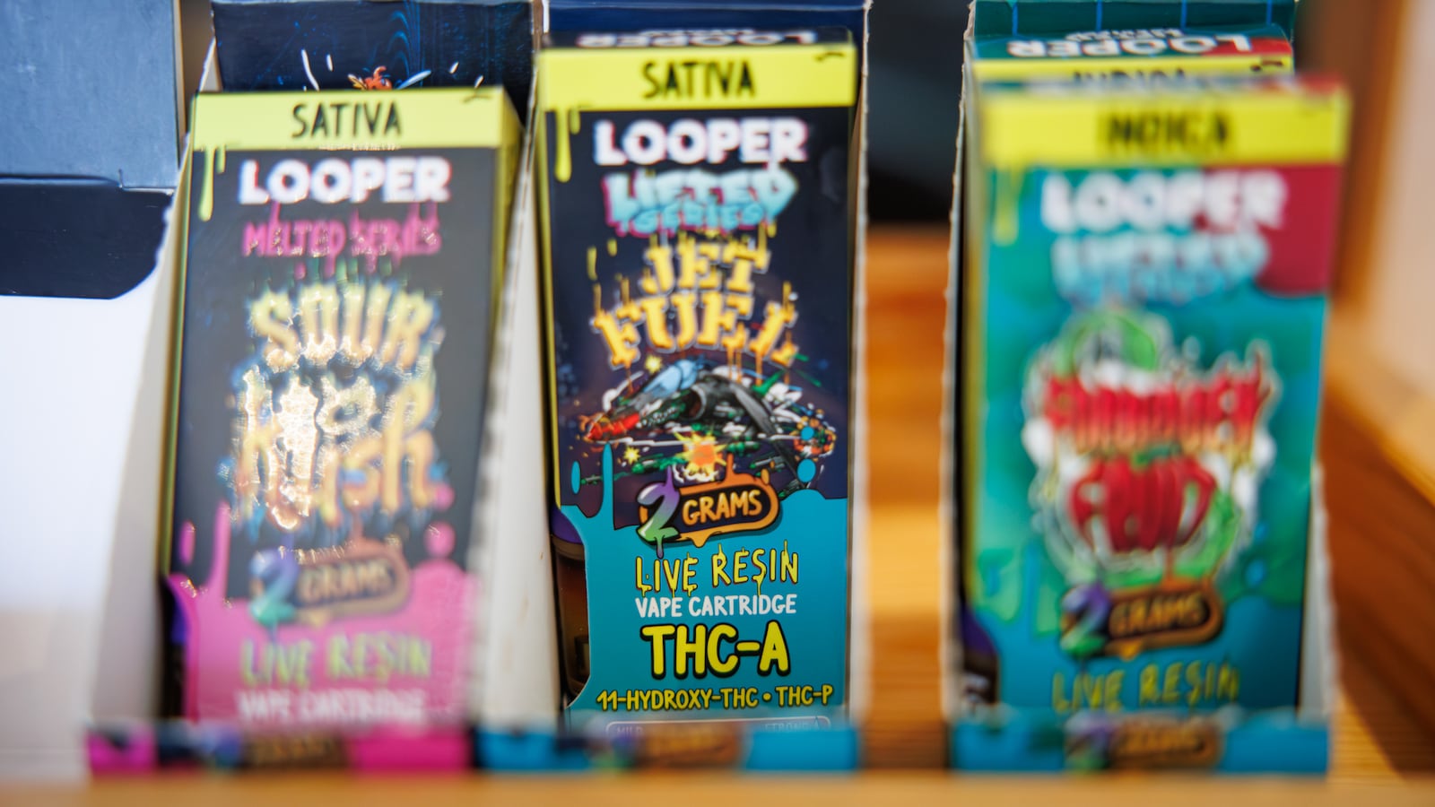 An executive order signed by Ohio Gov. Mike DeWine on Oct. 8 that takes effect Tuesday bans the sale of intoxicating hemp products for the next several months. Local smoke shops, like Vapor Haus on Watervliet Avenue in the Belmont neighborhood, are offering deep discounts for the hemp-derived THC products they sell. BRYANT BILLING / STAFF