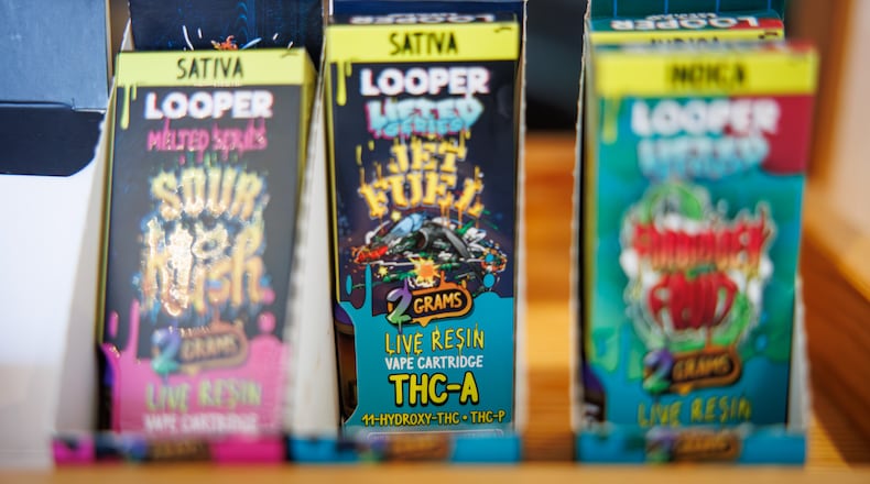 An executive order signed by Ohio Gov. Mike DeWine on Oct. 8 that takes effect Tuesday bans the sale of intoxicating hemp products for the next several months. Local smoke shops, like Vapor Haus on Watervliet Avenue in the Belmont neighborhood, are offering deep discounts for the hemp-derived THC products they sell. BRYANT BILLING / STAFF