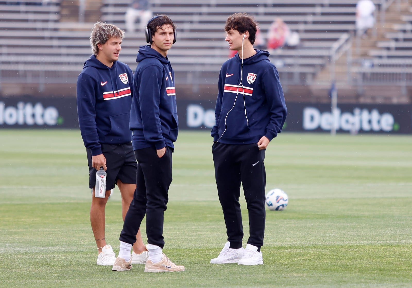 United States defender John Tolkin, left, talks with teammates Brenden Aaronson, center, and forward Paxten Aaronson before the start of an international friendly soccer game against Turkey, Saturday, June 7, 2025, in East Hartford, Conn. (AP Photo/Mary Schwalm)