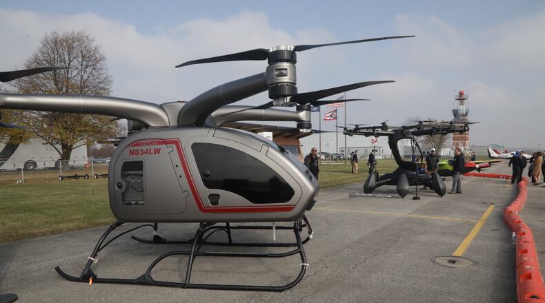 The Springfield-Beckley Municipal Airport hosted the 2021 Ohio Advanced Air Mobility Showcase Wednesday, Nov. 10, 2021. The leading companies in the field of advanced air mobility, or flying cars, were on hand to showcase their work for local, state and National officials. BILL LACKEY/STAFF