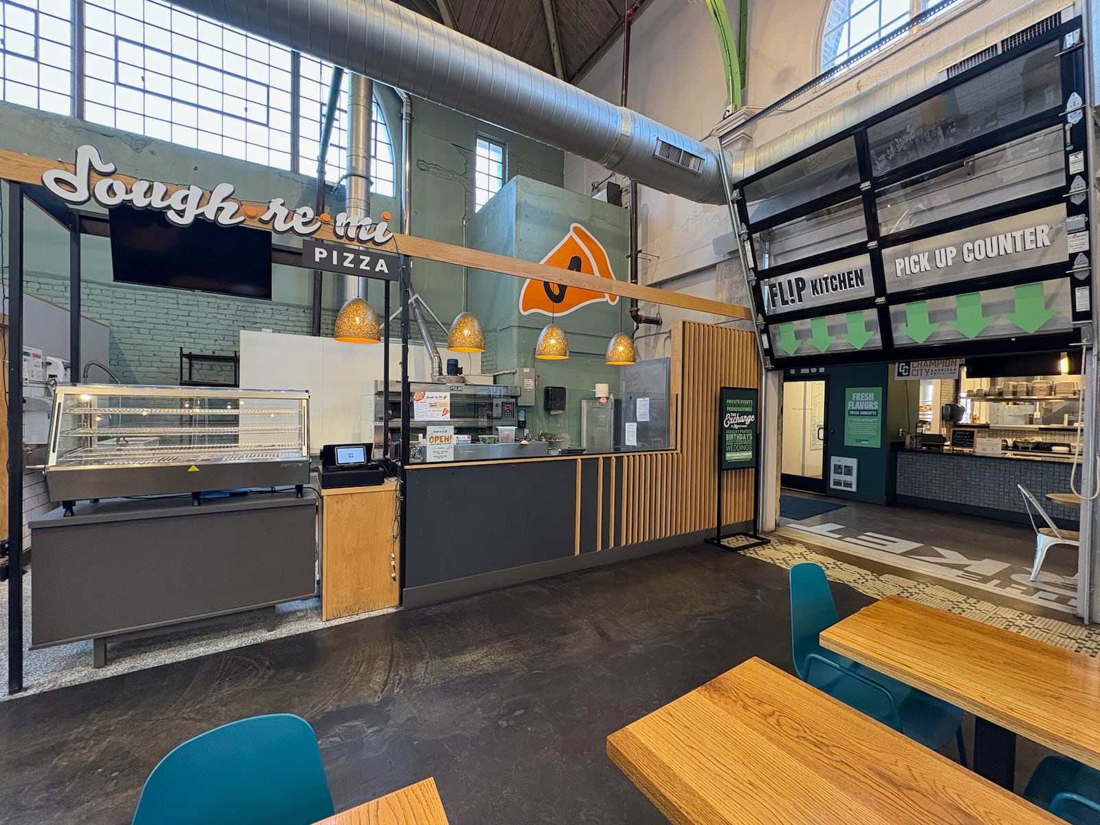 Dough-Re-Mi Pizza and Champion City Grill inside Myers Market in Springfield. Brooke Spurlock/Staff