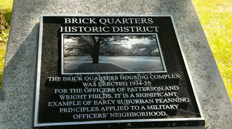 The Air Force is exploring a "full gamut"of options to tear down or fund a costly renovation of historic brick homes at Wright-Patterson, which has nearly all of the dozens of remaining government-owned homes in the military branch. This home was constructed with 88 others between 1934-37 that are listed on the National Register of Historic Places in the Brick Quarters Housing District. TY GREENLEES / STAFF