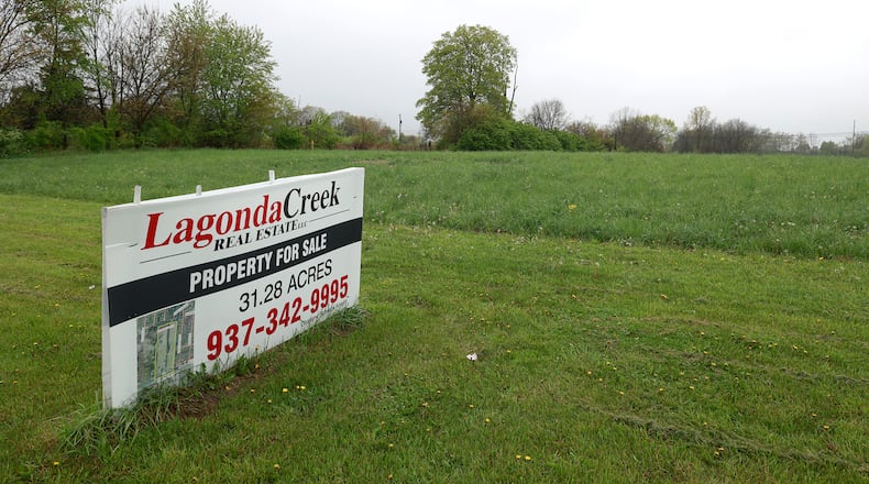 The site of the D.R. Horton residential subdivision in the area of 330 Tuttle Road, Springfield that was scrapped. BILL LACKEY/STAFF