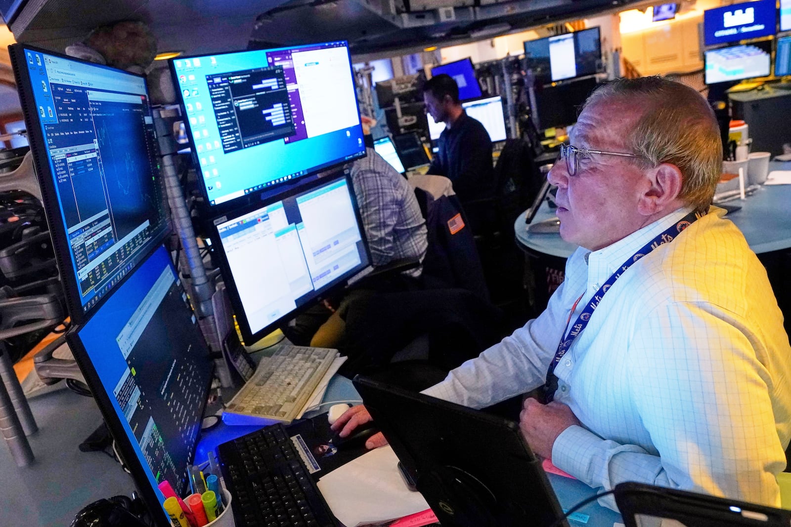 Trader Richard Cohen works on the floor of the New York Stock Exchange, Tuesday, July 8, 2025. (AP Photo/Richard Drew)