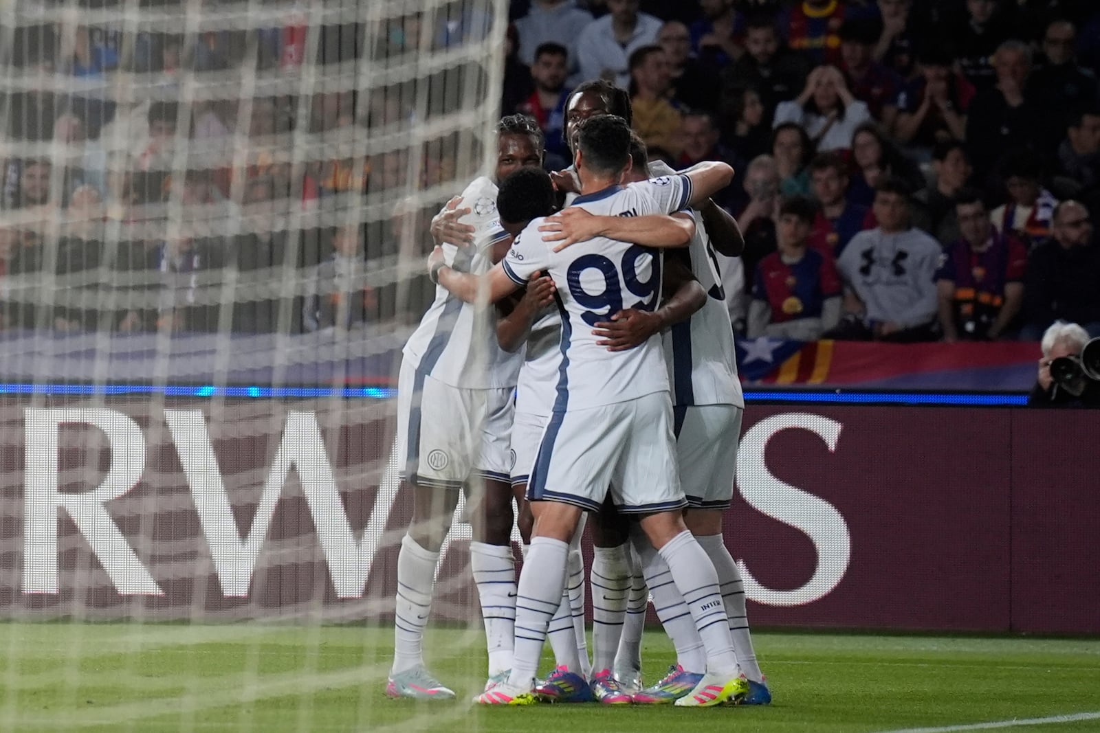 Inter Milan players celebrate after a goal during the Champions League semifinal first leg soccer match between Barcelona and Inter Milan in Barcelona, Spain, Wednesday, April 30, 2025. AP Photo/Emilio Morenatti)