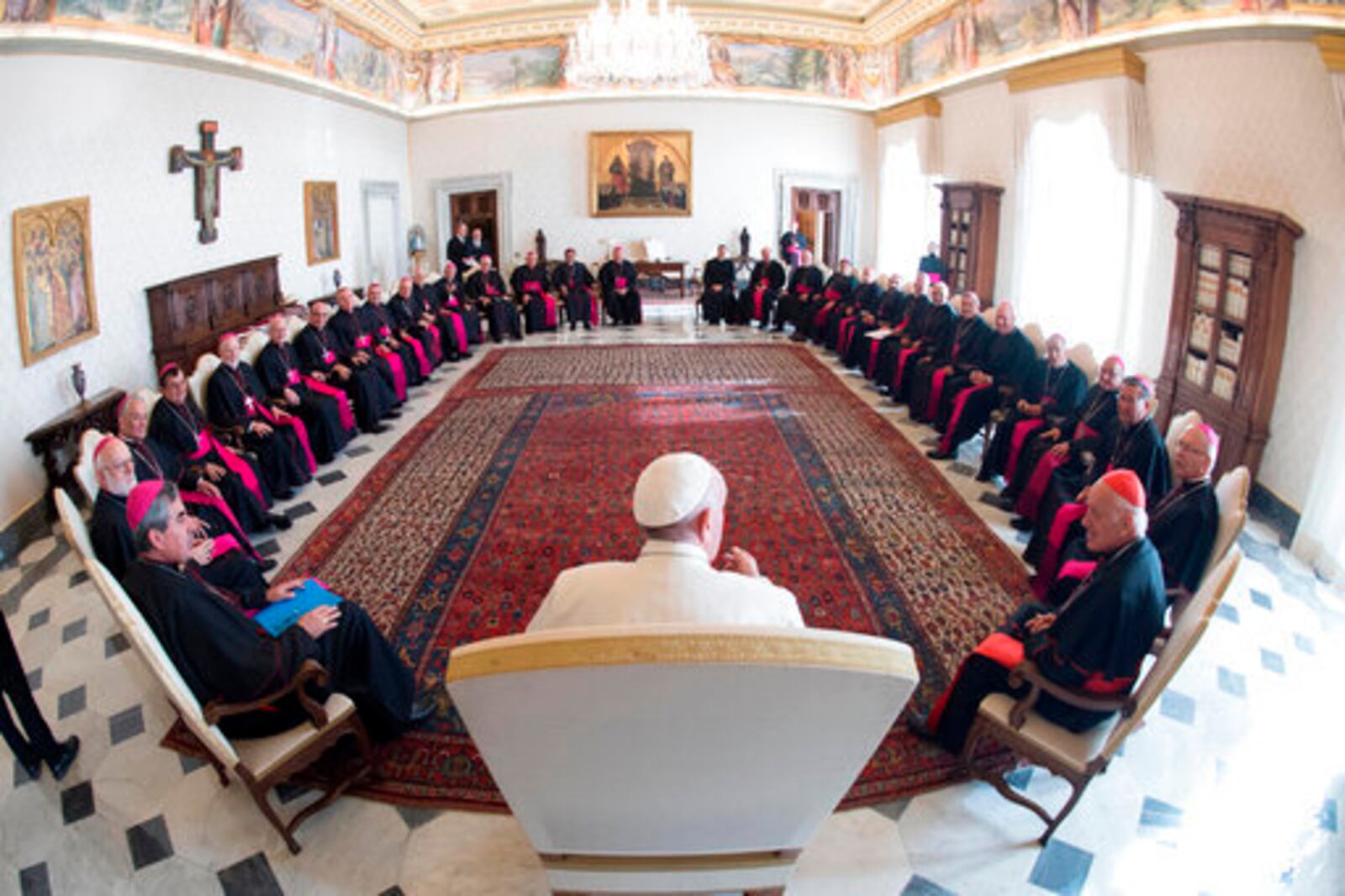 FILE - In this Feb. 20, 2017 file photo, Pope Francis meets with the Chilean Bishops Conference, at the Vatican. (L'Osservatore Romano/Pool Photo via AP, file)