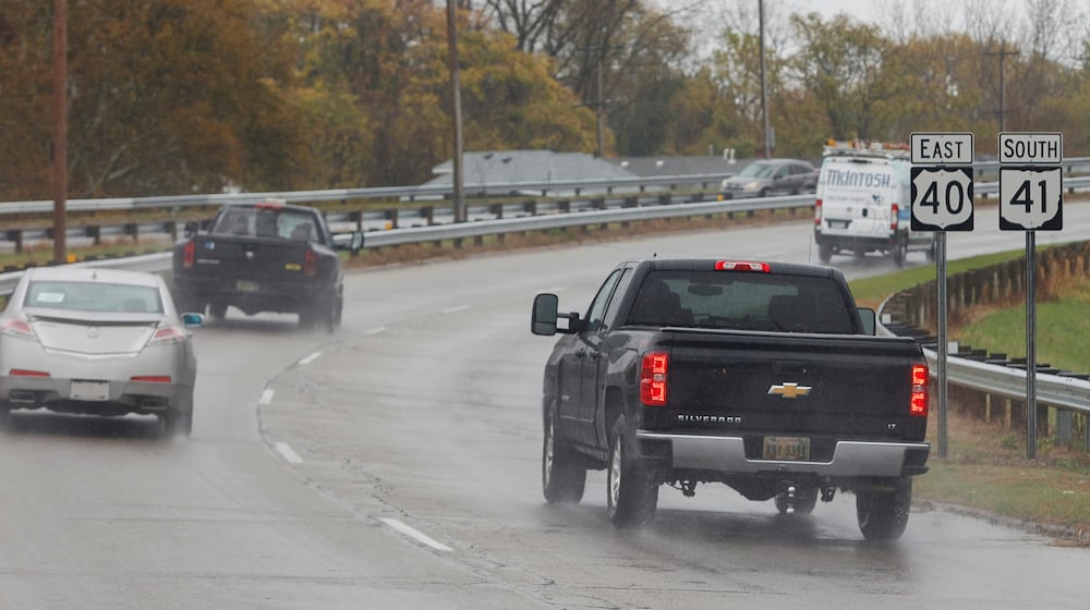 Vehicles travel on State Route 41 on the rainy afternoon of Thursday, October 30, 2025, in Springfield JOSEPH COOKE/STAFF