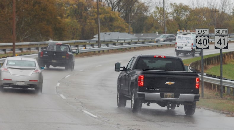 Vehicles travel on State Route 41 on the rainy afternoon of Thursday, October 30, 2025, in Springfield JOSEPH COOKE/STAFF