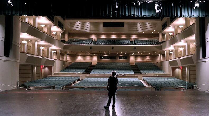 Lori Common, assistant to the executive director of the Clark State Performing Arts Center looks over Kuss Auditorium Tuesday. BILL LACKEY/STAFF