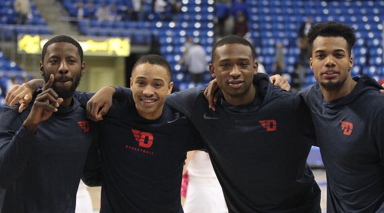 Dayton’s seniors pose for a photo after the game. David Jablonski/Staff