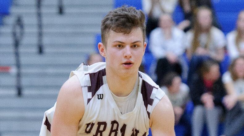Urbana senior forward Riley Emmons dribbles during a Division II sectional final against Shawnee on Friday. BRYANT BILLING / CONTRIBUTED