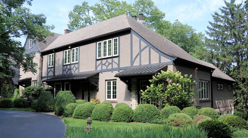 Listed for $1,150,000 by Wright-Patt Realty Inc., the two-story stucco home in Oakwood home has about 4,954 square feet of living space. Mature trees and landscaping surround the home, which is on a 0.75-acre lot.