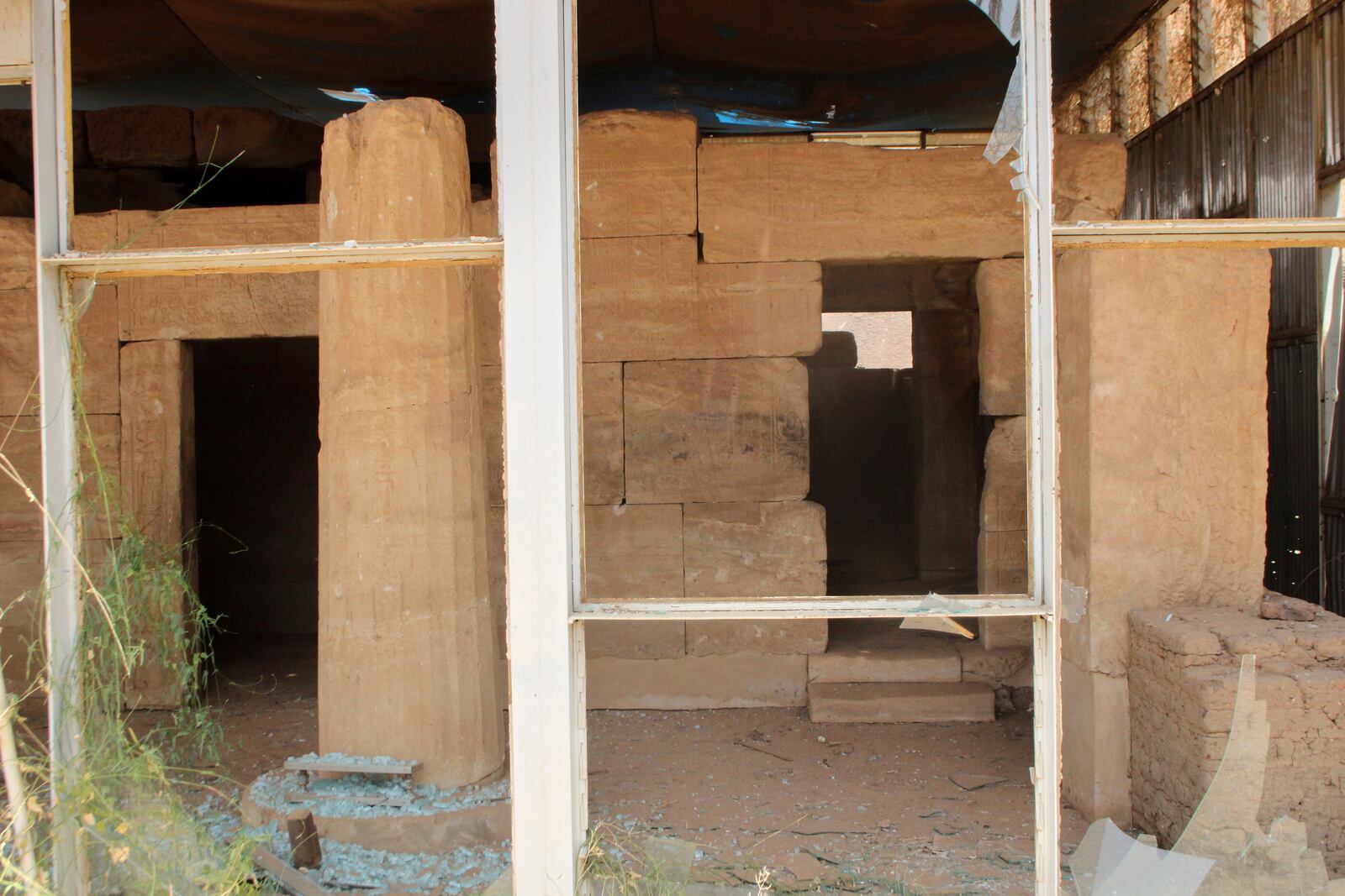 Windows of Sudan National Museum, the home to the country's largest artifacts that date to different eras of Sudanese history, are shattered after nearly two years of war between the army and paramilitary Rapid Support Forces (RSF), in Khartoum, Sudan, Thursday, April 3, 2025. (AP Photo/Khaled Abd Al Gader)