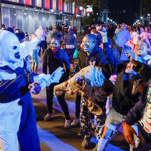 Kids gather to dance during Springfield Trick or Treat on Friday, Oct.24, 2025, in downtown Springfield. JOSEPH COOKE/STAFF