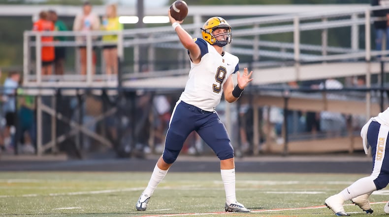 Springfield High School senior quarterback Bryce Schondelmyer throws the ball during their game against Beavercreek on Friday, Sept. 16, 2022 at Miami Valley Hospital Stadium in Beavercreek. Schondelmyer threw six TD passes as the Wildcats won 49-17. CONTRIBUTED PHOTO BY MICHAEL COOPER