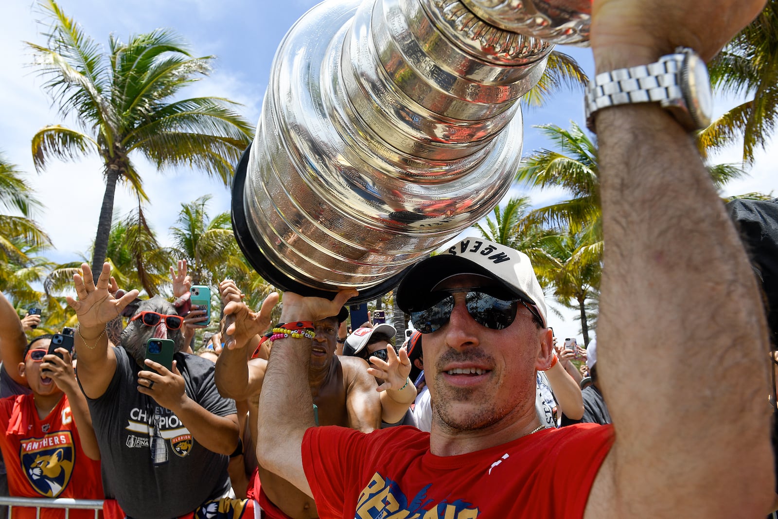 Florida Panthers Brad Marchand celebrates with fans during the NHL hockey team's Stanley Cup championship celebration, Sunday, June 22, 2025, in Fort Lauderdale, Fla (AP Photo/Michael Laughlin)