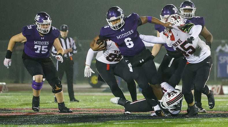 Middletown quarterback Joseph Ward carries the ball during their Division I Regional football final against Wayne Friday, Nov. 21, 2025 at Trotwood Madison High School. Middletown won 21-14 to advance. NICK GRAHAM/STAFF