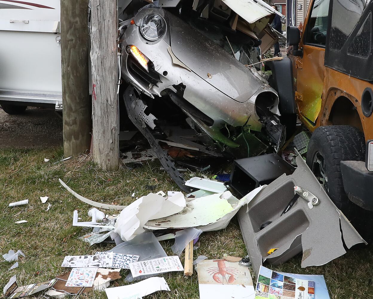 PHOTOS: Porsche Crashes Through Camper