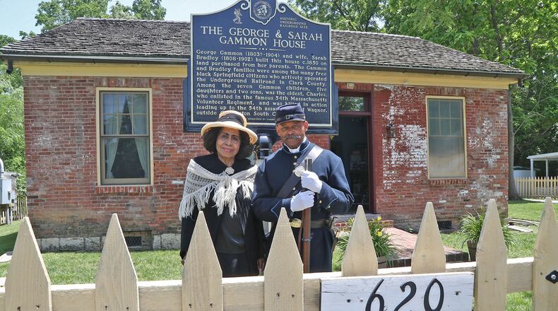Dorothy Booker and Dale Henry at The George and Sarah Gammon House, where the Juneteenth Celebration will be held on Saturday. BILL LACKEY/STAFF