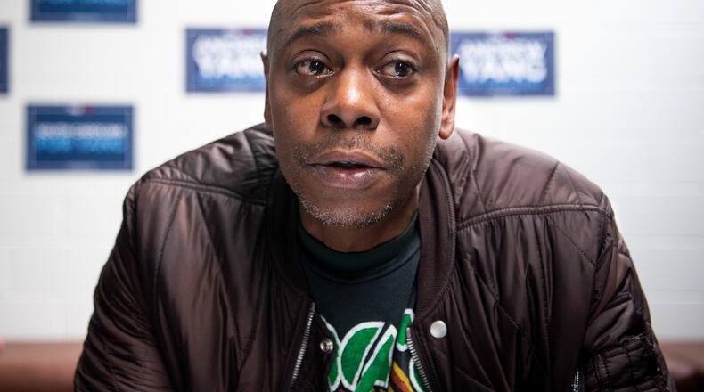 Comedian Dave Chappelle talks with the media while campaigning for Democratic presidential candidate Andrew Yang on Jan. 30, 2020, in North Charleston, South Carolina. (Sean Rayford/Getty Images/TNS)