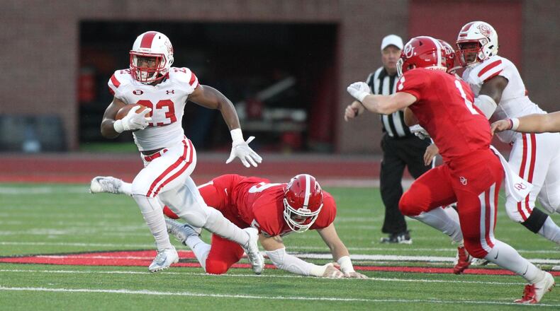 Wittenberg’s Jaheem Washington runs against Denison on Saturday, Sept. 29, 2018, at Deeds Field in Granville. David Jablonski/Staff