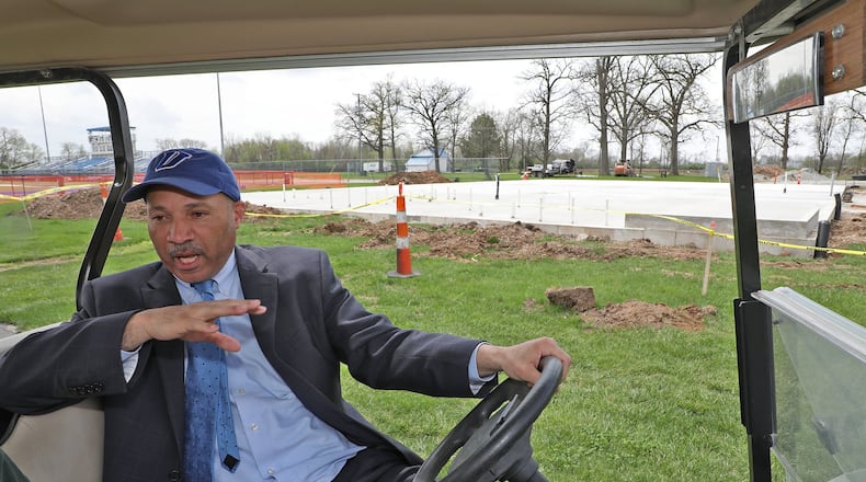 Dr. Christopher Washington, president of Urbana University, talks about the new multipurpose athletic building their building on the Urbana campus. Bill Lackey/Staff