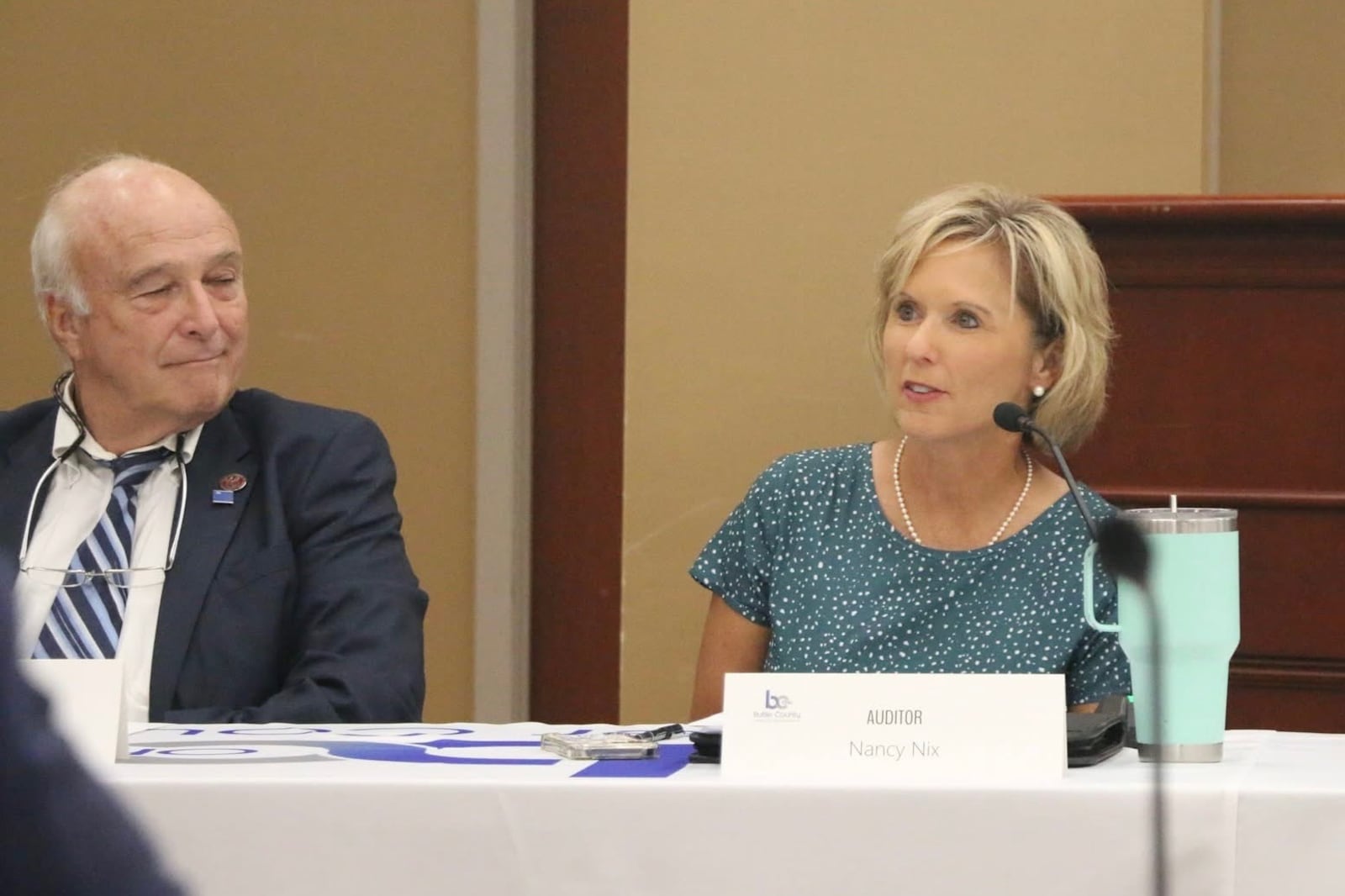 Butler County Auditor Nancy Nix and Prosecutor Mike Gmoser participate in the fifth county property tax summit with state lawmakers and local leaders. Officials are trying to find ways to solve the crippling property tax issue that has some losing their homes.