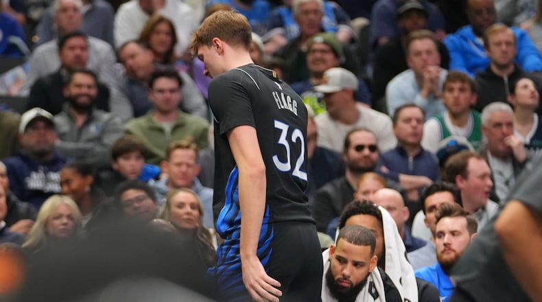 Dallas Mavericks forward Cooper Flagg leaves the court and heads to the locker room during the first half of an NBA basketball game against the Denver Nuggets Wednesday, Jan. 14, 2026, in Dallas. (AP Photo/Julio Cortez)