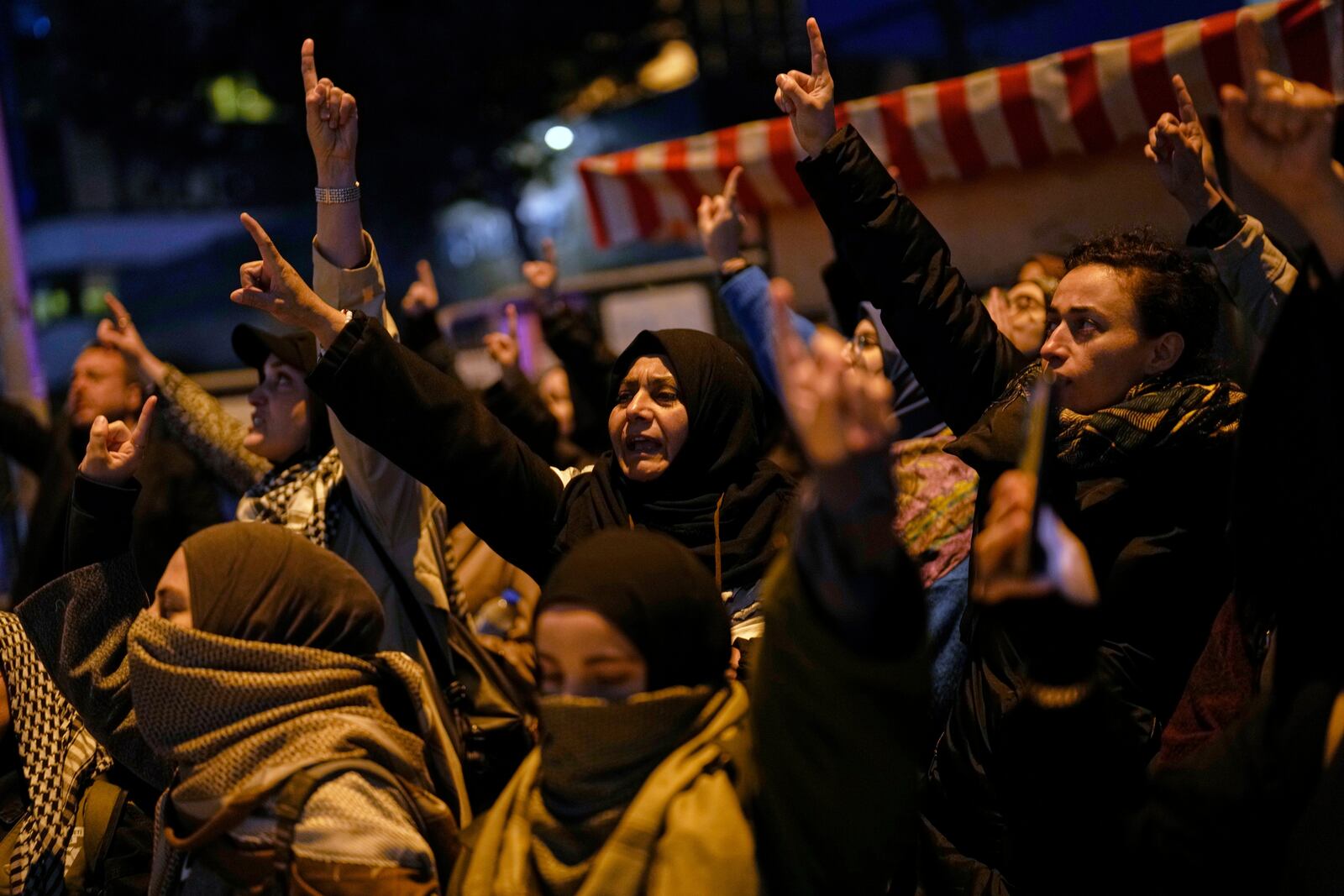 People protest against an Israeli drone attack on a vessel carrying aid to Gaza in international waters off Malta, outside the Israeli consulate in Istanbul, Friday, May 2, 2025. (AP Photo/Khalil Hamra)