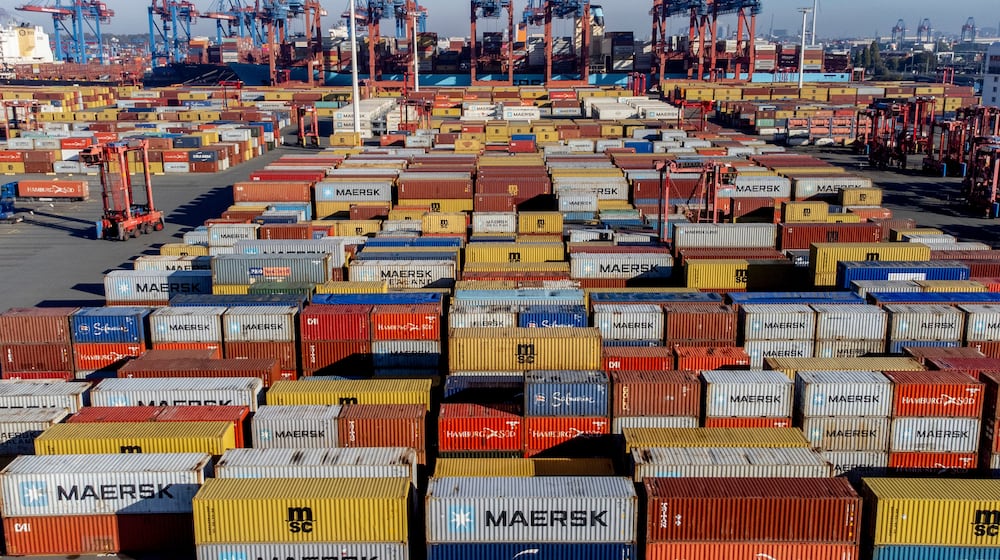 FILE - Containers are piled up in the harbor in Hamburg, Germany, on Oct. 26, 2022. (AP Photo/Michael Probst, file)