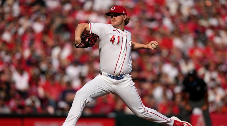 Cincinnati Reds pitcher Andrew Abbott throws during the second inning of an opening-day baseball game against the Boston Red Sox in Cincinnati, Thursday, March 26, 2026. (AP Photo/Carolyn Kaster)