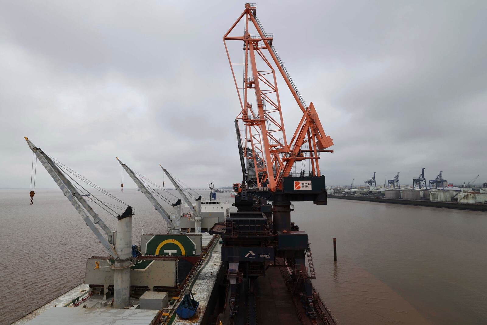 Coking coal is unloaded at Immingham Port, northern England, Tuesday, April 15, 2025. (Darren Staples/Pool Photo via AP)