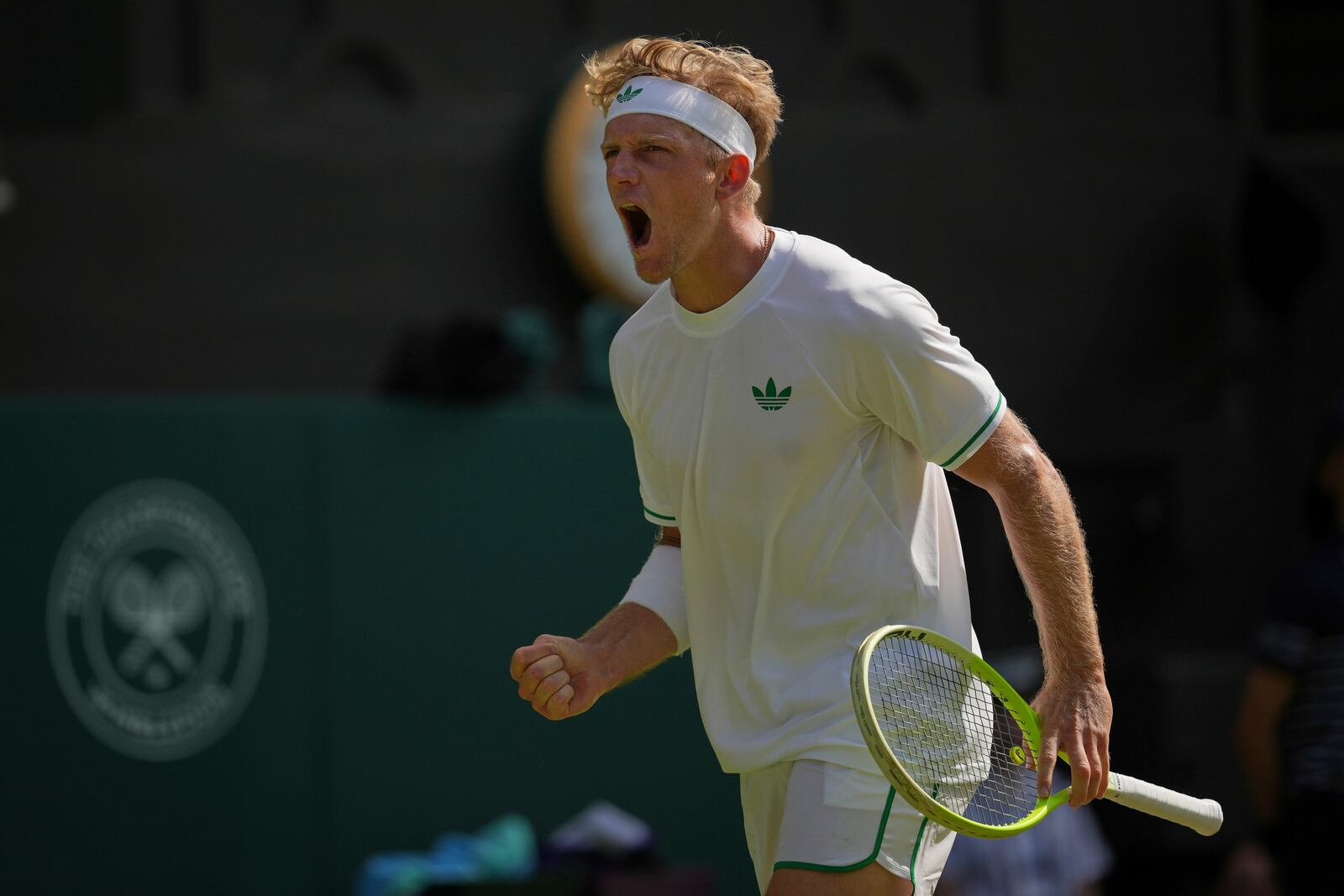 Alejandro Davidovich Fokina of Spain reacts after winning a point against Taylor Fritz of the U.S. during a third round singles match at the Wimbledon Tennis Championships in London, Friday, July 4, 2025. (AP Photo/Kin Cheung)