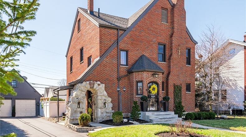 The brick two story in Oakwood is close to shopping and schools and has been almost entirely updated.l