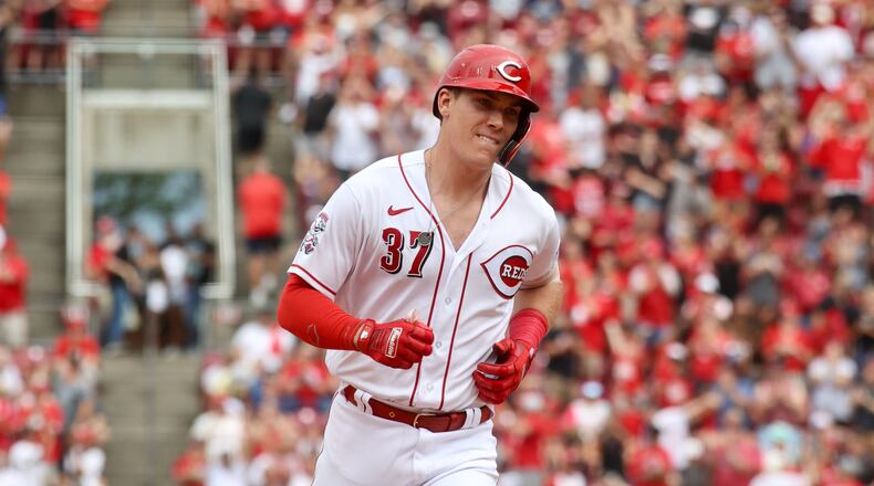 Tyler Stephenson, of the Reds, rounds the bases after hitting a two-run tie-breaking home run against the Padres in the eighth inning on Sunday, July 2, 2023, at Great American Ball Park in Cincinnati. David Jablonski/Staff