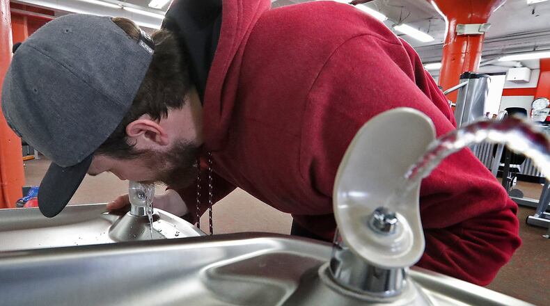 Codey Adams gets a drink from the drinking fountain at Springfield Health and Fitness. The Clark County Combined Health District will seek to ask voters to put adding fluoride to Springfield’s water system on the ballot in May or November. Bill Lackey/Staff