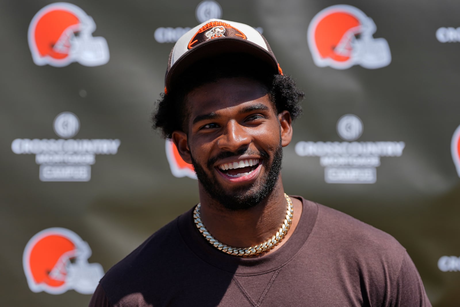 Cleveland Browns quarterback Shedeur Sanders (12) speaks at a news conference during the NFL football team's rookie minicamp in Berea, Ohio, Saturday, May 10, 2025. (AP Photo/Sue Ogrocki)