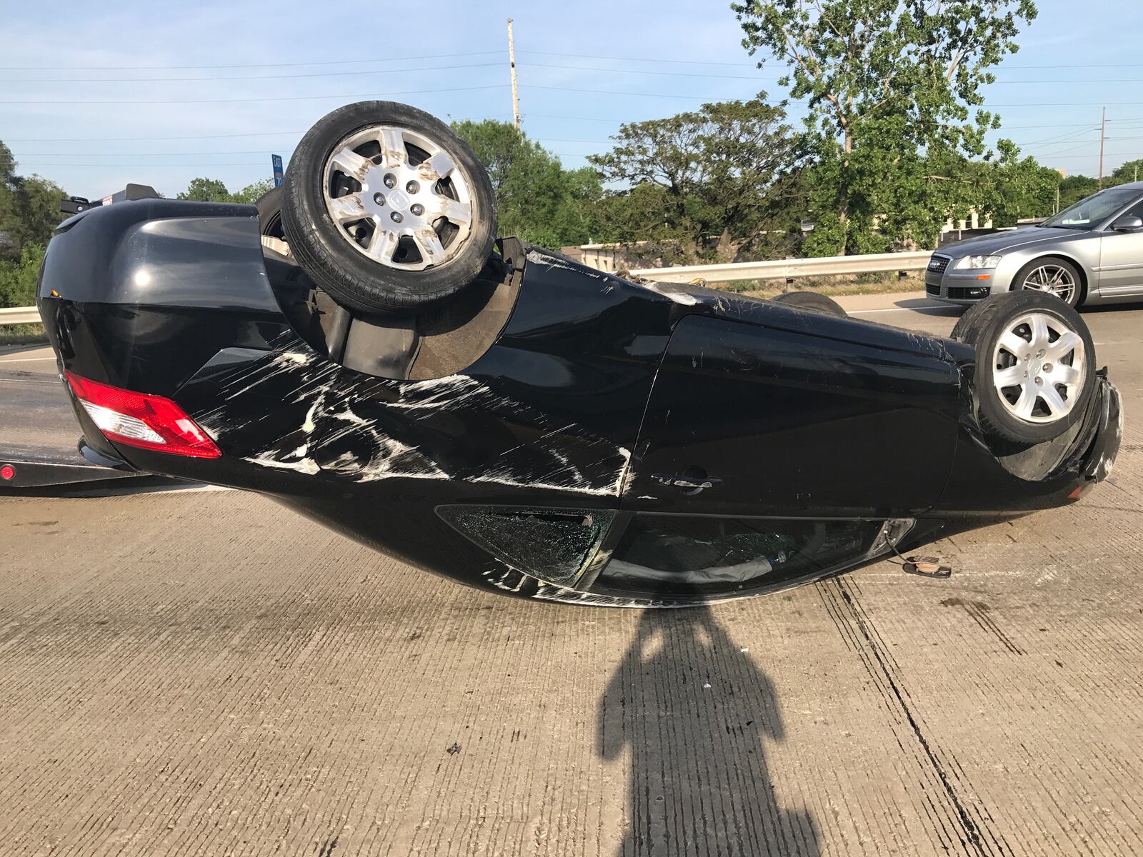 The chief of the Indianapolis Metropolitan Police Department and two other people pulled an injured driver to safety from this car on Monday evening, May 15, 2017. (Courtesy/IMPD)