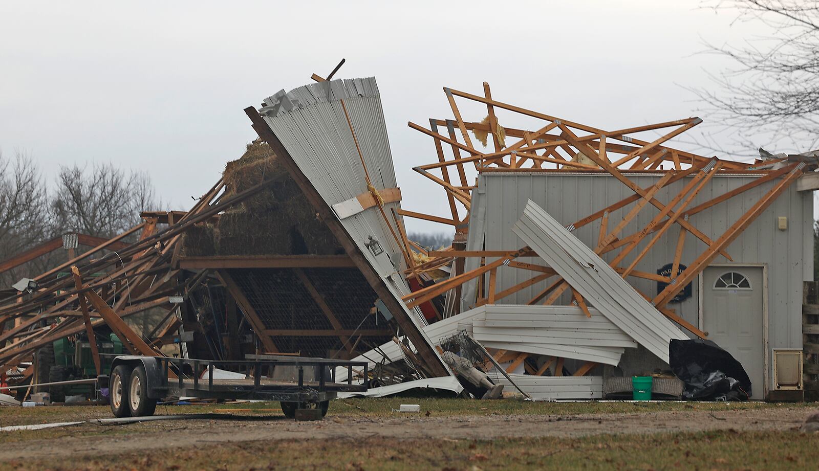 A destroyed barn on Fletcher-Chapel Road in Clark County Wednesday, Feb. 28, 2024. BILL LACKEY/STAFF