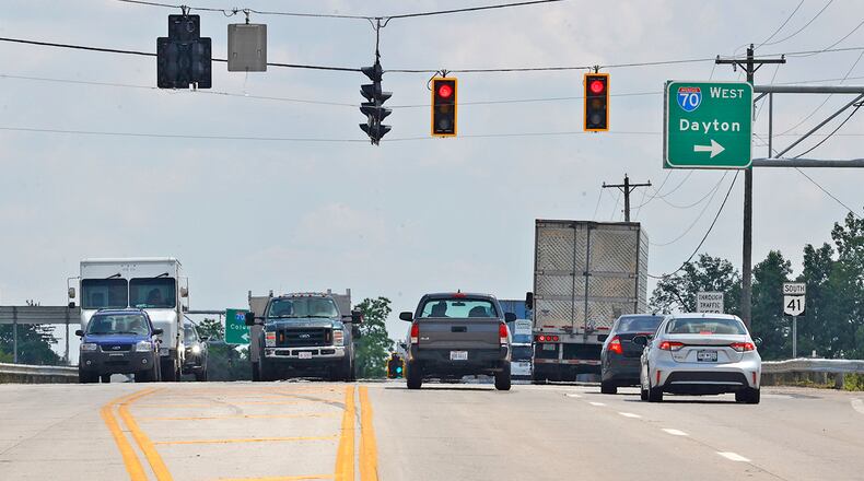 Clark County wants to widen the Ohio Route 41 overpass over Interstate 70 from four lanes to six to accommodate all the traffic from the new business at the interchange. BILL LACKEY/STAFF