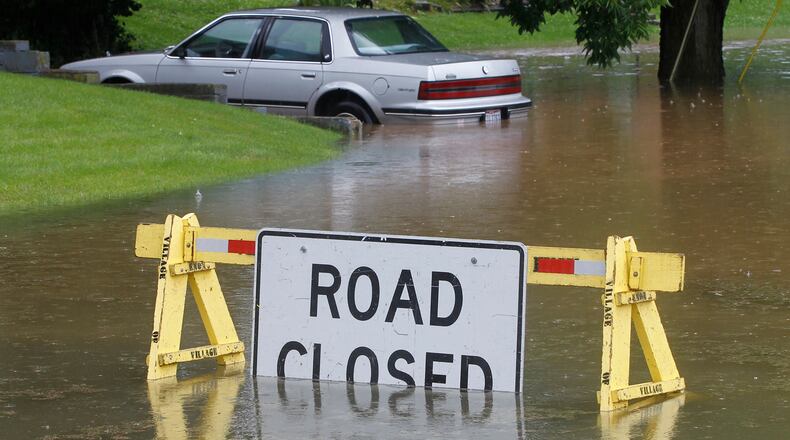 Grand Valley Drive off of Enon-Xenia Road was closed due to flooding in 2017. Bill Lackey/Staff