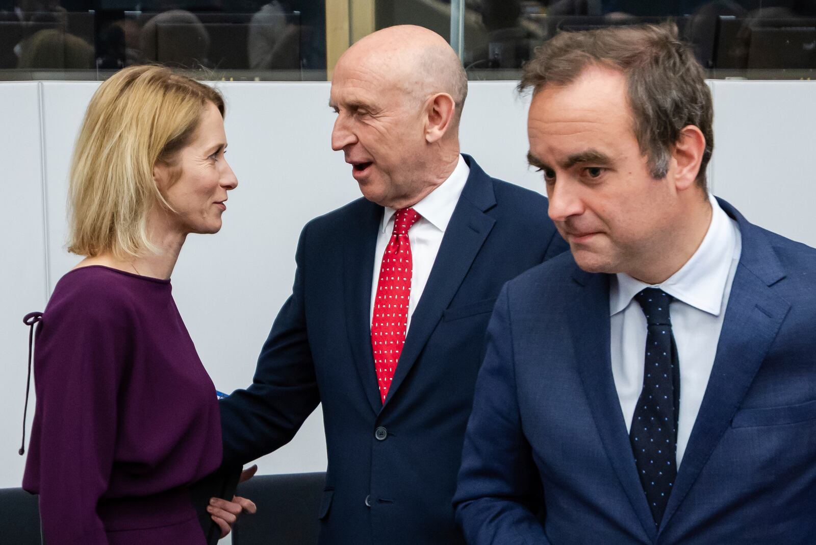 European Union foreign policy chief Kaja Kallas, left, speaks with Britain's Defense Secretary John Healey, center, as French Defense Minister Sebastien Lecornu arrives for a coalition of the willing defence ministers meeting at NATO headquarters in Brussels, Belgium, Thursday, April 10, 2025. (AP Photo/Geert Vanden Wijngaert)