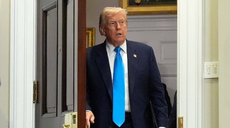 President Donald Trump arrives to sign the VA Home Loan Program Reform Act into law in the Roosevelt Room at the White House, Wednesday, July 30, 2025, in Washington. (AP Photo/Mark Schiefelbein)