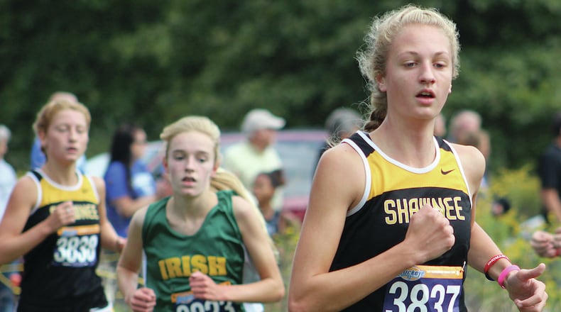 Shawnee junior Grace Holmes, also a standout on the track team, runs on her way to a second-place finish at the Buck Creek Invitational cross country race. Jeff Gilbert/Contributed photo