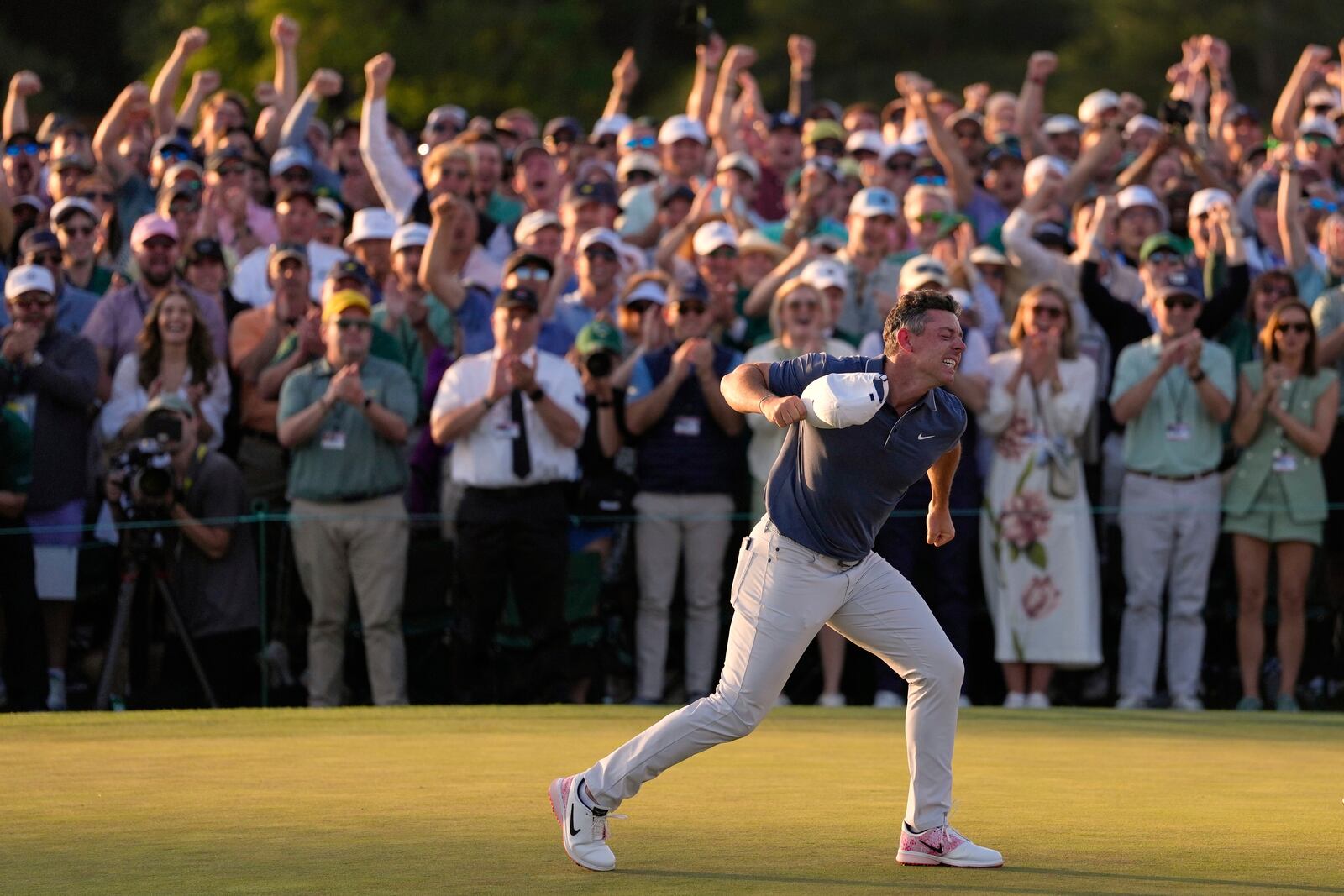 Rory McIlroy, of Northern Ireland, reacts after winning in a playoff against Justin Rose after the final round at the Masters golf tournament, Sunday, April 13, 2025, in Augusta, Ga. (AP Photo/Ashley Landis)