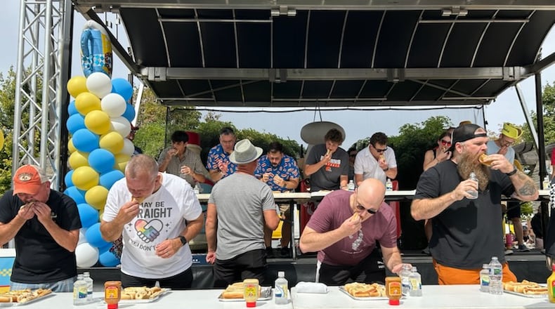 MustardFEST's hot mustard and horseradish eating contest saw competitors trying to down hot dogs covered with Woeber's condiments that got progressively hotter. Jack Legath won the title for the second straight year. BRETT TURNER FOR THE NEWS-SUN