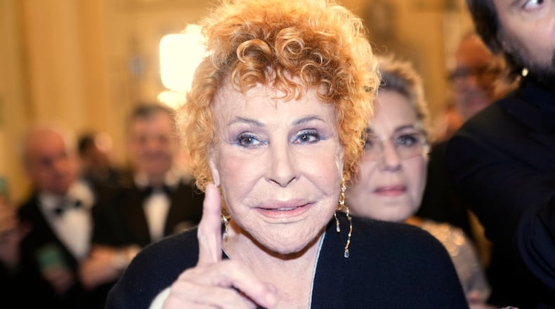 FILE - Italian Singer Ornella Vanoni arrives to attend La Scala opera house's gala season opener, in Milan, Italy, on Dec. 7, 2023. (AP Photo/Luca Bruno, File)