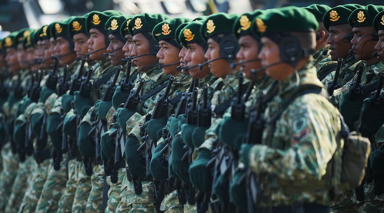 FILE - Indonesian soldiers march during a ceremony commemorating the 80th anniversary of the Indonesian Armed Forces in Jakarta, Indonesia, Sunday, Oct. 5, 2025. (AP Photo/Tatan Syuflana, File)